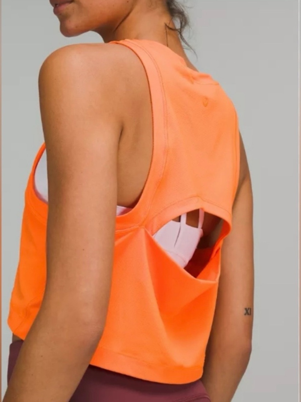 Lululemon Open-Back Cropped Training Tank Top in Orange